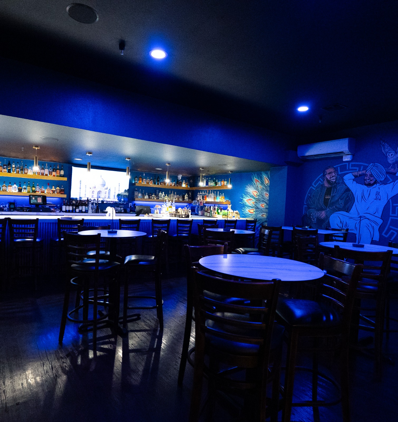 A bar lit in blue.